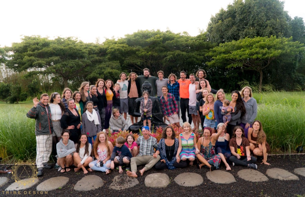 Group photo together outdoors at dusk