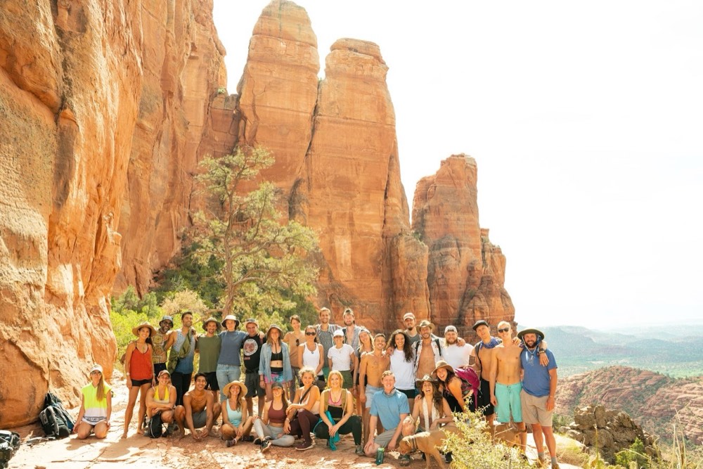 Group photo at the base of red rock spires
